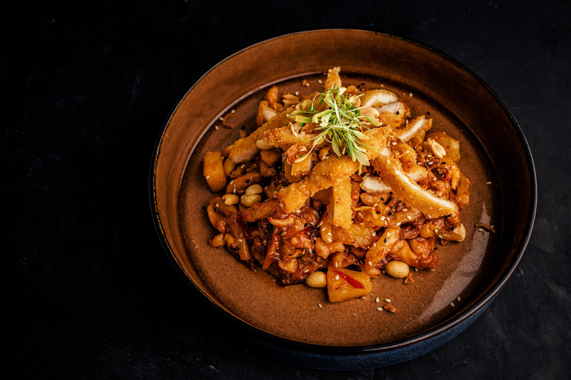 Top view of a meal with meat and pasta, course meal at the restaurant.